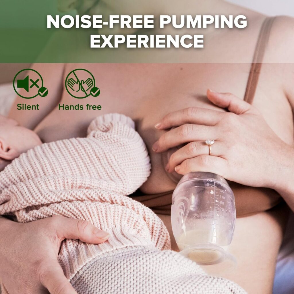 Mother using a silent, hands-free breast pump while holding a newborn wrapped in a soft pink blanket